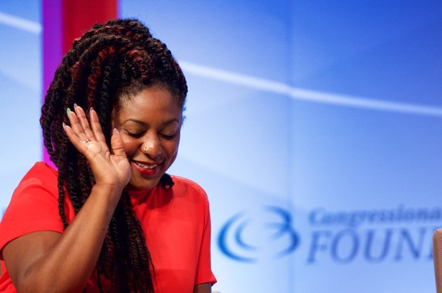WASHINGTON, DC - SEPTEMBER 17: Co-Founder of Black Lives Matter Alicia Garza serves as a panelist for the National Town Hall: 'Black Lives Matter' discussion at Walter E. Washington Convention Center on September 17, 2015 in Washington, DC. (Photo by Earl Gibson III/Getty Images)
