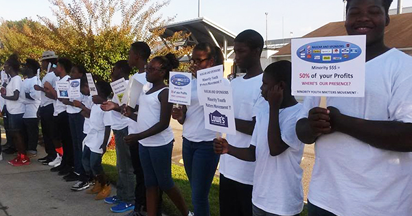 Minority Youth Matters protesters at the Chicagoland Speedway protesting systematic discrimination in America