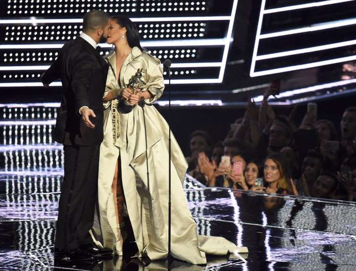 Provided by New York Daily News Drake presents Rihanna with the The Video Vanguard Award during the 2016 MTV Video Music Awards at Madison Square Garden. - Michael Loccisano/Getty Images