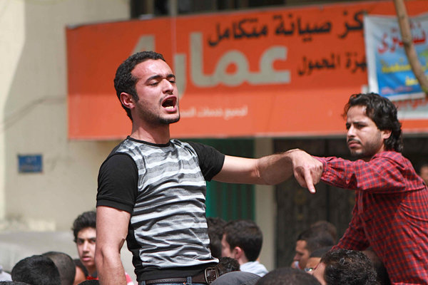 FILE - In this April 1, 2011 file photo, activist Ahmed Douma chants slogans during a march to Tahrir Square demanding the prosecution of members of former President Hosni Mubarak's government in Cairo, Egypt. A defense lawyer said Tuesday, Jan. 27, 2015 that Egypts highest appeal court has upheld the convictions and three-year prison sentences handed down to Ahmed Maher, Ahmed Douma and Mohammed Adel, three of Egypts most prominent political activists for violating a draconian protest law. The decision leaves them with no more recourse to legal action. (AP Photo/Sarah Carr, File)