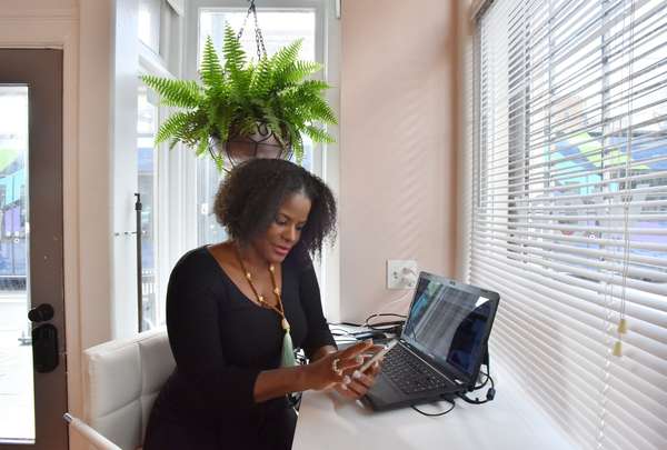 Dr. Dionne Mahaffey uses the WhereU application she created to help identify black-owned businesses. So far, she has about 70,000 businesses on the app. HYOSUB SHIN / HSHIN@AJC.COM