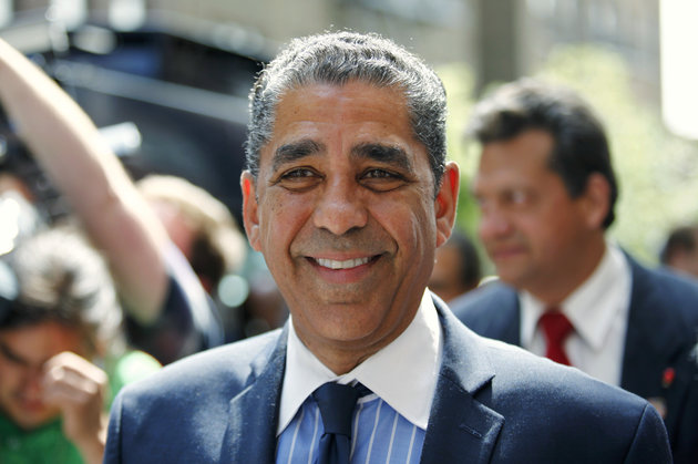 Senator Adriano Espaillat (C) exits a voting center after voting in the Democratic Primary election in New York June 24, 2014. REUTERS/Eduardo Munoz (UNITED STATES - Tags: POLITICS ELECTIONS)